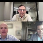 A virtual meeting with five professionally dressed people, each appearing in separate screens. Three men and two women are smiling or looking attentive, seated in well-lit indoor settings. Names and titles are visible on screen.