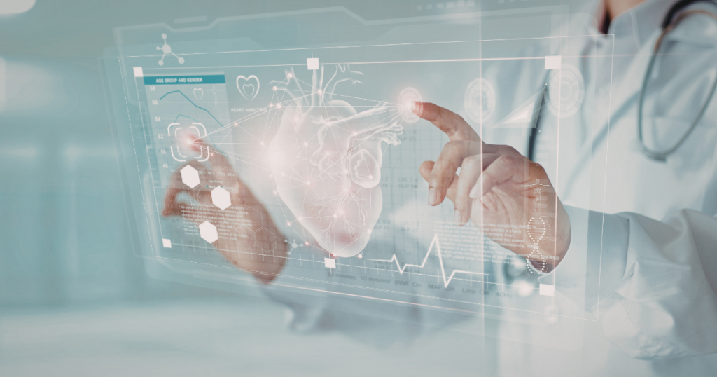 A doctor interacts with a transparent digital screen displaying a 3D heart model, medical icons, and health data, including a heart rate graph, in a futuristic medical setting.